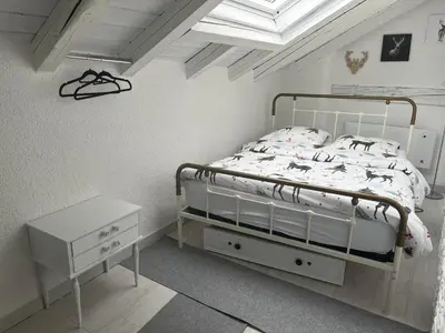 Ein Bett oder Betten in einem Zimmer der Unterkunft Les coeurs brisés