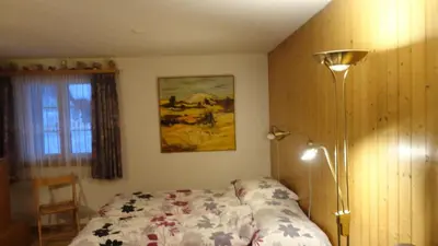 Ein Bett oder Betten in einem Zimmer der Unterkunft Schweiz ,Lenk Ferienwohnung,Kinderfreundl,Seniorenfreundlich