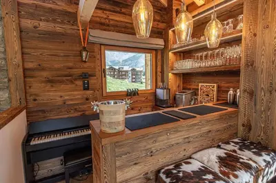 Ein Bett oder Betten in einem Zimmer der Unterkunft Sonnhalde II - Luxury Chalet