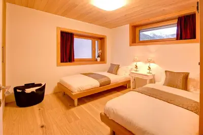 Ein Bett oder Betten in einem Zimmer der Unterkunft Chalet Chloe - Saas-Fee