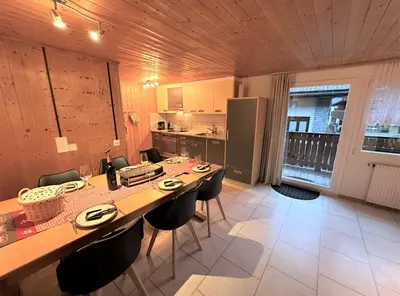 Küche/Küchenzeile in der Unterkunft Ski-in, central and cosy in the Chalet Diana, free access to swimming pool