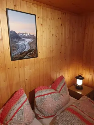 Ein Bett oder Betten in einem Zimmer der Unterkunft Ski-in, central and cosy in the Chalet Diana, free access to swimming pool
