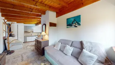 Ein Sitzbereich in der Unterkunft Apartment in the heart of nature