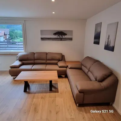 Ein Sitzbereich in der Unterkunft Mountain-Lake Apartment 2