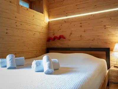 Ein Bett oder Betten in einem Zimmer der Unterkunft Chalet Mayen du Bleusy by Interhome