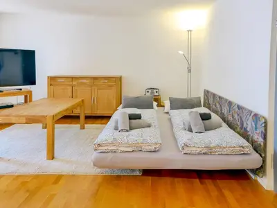 Ein Bett oder Betten in einem Zimmer der Unterkunft Apartment Orya by Interhome