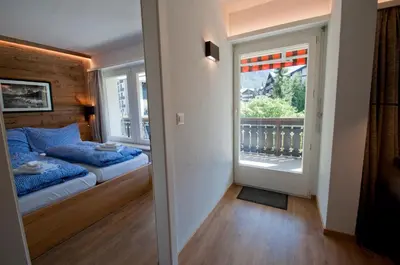 Ein Bett oder Betten in einem Zimmer der Unterkunft Haus Matten, Apartment Breithorn