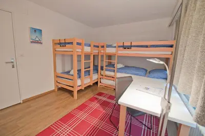 Ein Bett oder Betten in einem Zimmer der Unterkunft Haus Matten, Apartment Breithorn