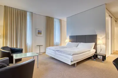 Ein Bett oder Betten in einem Zimmer der Unterkunft Hôtel Au Terminus
