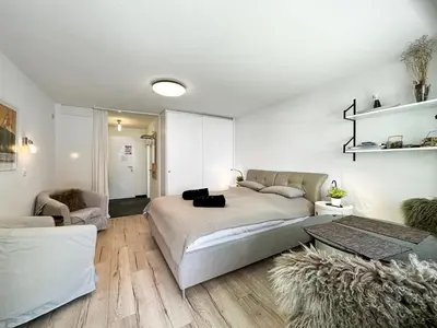 Ein Bett oder Betten in einem Zimmer der Unterkunft Studio Marmotta - Zermatt