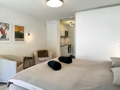 Ein Bett oder Betten in einem Zimmer der Unterkunft Studio Marmotta - Zermatt