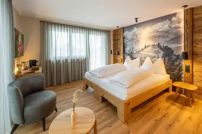 Ein Bett oder Betten in einem Zimmer der Unterkunft Mountain Lodge
