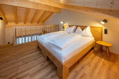Ein Bett oder Betten in einem Zimmer der Unterkunft Mountain Lodge