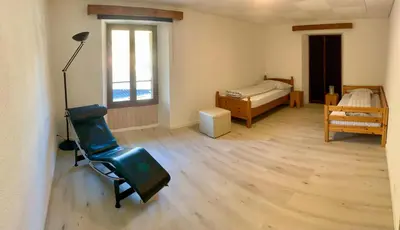 Ein Bett oder Betten in einem Zimmer der Unterkunft Lizard House