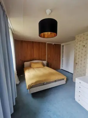 Ein Bett oder Betten in einem Zimmer der Unterkunft NEB-Thun Haus in Thun für 8 Pax