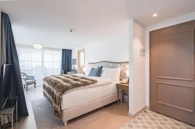 Ein Bett oder Betten in einem Zimmer der Unterkunft Mirabeau Etoile
