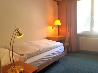 Ein Bett oder Betten in einem Zimmer der Unterkunft Self-Service Guesthouse Berggeist