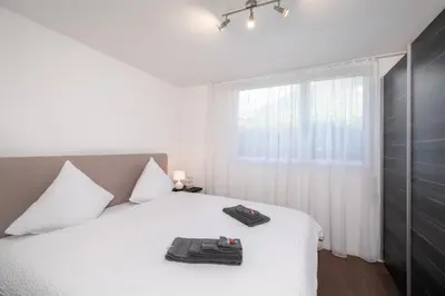 Ein Bett oder Betten in einem Zimmer der Unterkunft Schöne Parterrewohnung in Matten