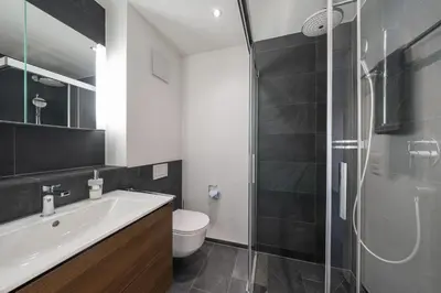 Ein Badezimmer in der Unterkunft Schöne Parterrewohnung in Matten