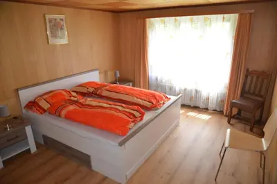 Ein Bett oder Betten in einem Zimmer der Unterkunft Grosse, schöne Wohnung im Grünen