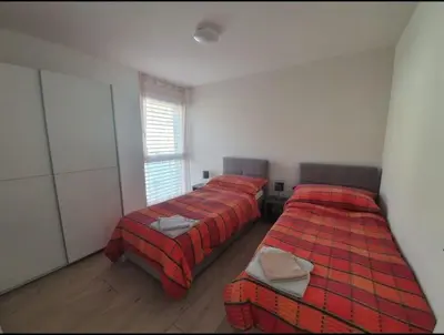 Ein Bett oder Betten in einem Zimmer der Unterkunft Jacqueline residence