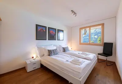 Ein Bett oder Betten in einem Zimmer der Unterkunft Chalet Bargsunna