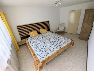 Ein Bett oder Betten in einem Zimmer der Unterkunft Petit Trianon 1,3 - Grosses Familiennest komplett renoviert