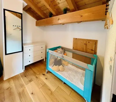 Ein Bett oder Betten in einem Zimmer der Unterkunft Maisonette 4.5 Zimmer, Nähe Ballenberg