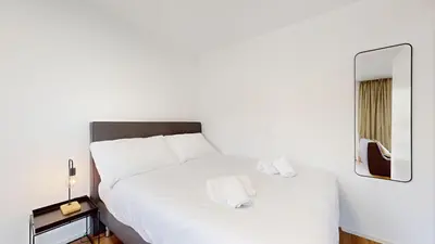 Ein Bett oder Betten in einem Zimmer der Unterkunft Bright & modern apartments in Sion