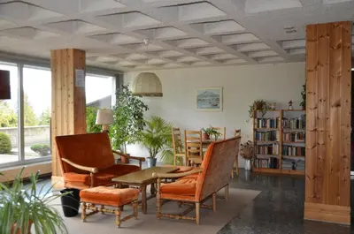 Ein Sitzbereich in der Unterkunft Immeuble Les Mélèzes