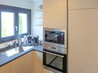 Küche/Küchenzeile in der Unterkunft Apartment Résidence La Fenière 03 by Interhome