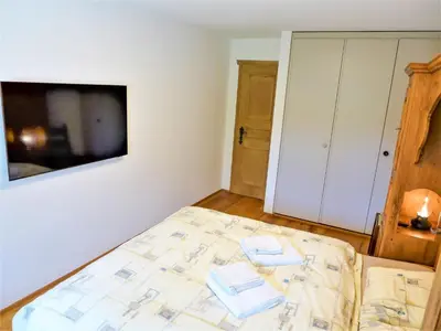 Ein Bett oder Betten in einem Zimmer der Unterkunft Apartment Résidence La Fenière 03 by Interhome