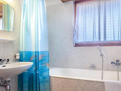 Ein Badezimmer in der Unterkunft Apartment Magrappé 344 by Interhome