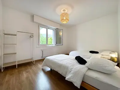 Ein Bett oder Betten in einem Zimmer der Unterkunft Castelview - Sion next to the old town