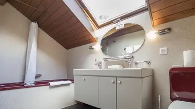 Ein Badezimmer in der Unterkunft Rössli Holiday Apartment