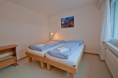 Ein Bett oder Betten in einem Zimmer der Unterkunft Haus Matten, Apartment Birch