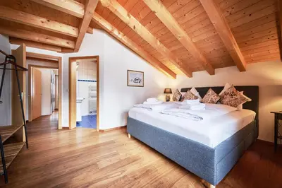 Ein Bett oder Betten in einem Zimmer der Unterkunft Eagle's Nest