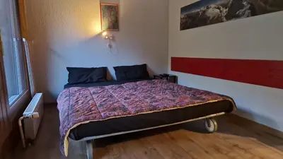 Ein Bett oder Betten in einem Zimmer der Unterkunft La Remointze