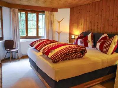 Ein Bett oder Betten in einem Zimmer der Unterkunft Apartment Im Chehr by Interhome