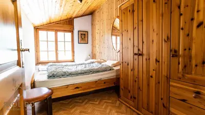 Ein Bett oder Betten in einem Zimmer der Unterkunft Gemütliches Ferienhaus Brigerbad