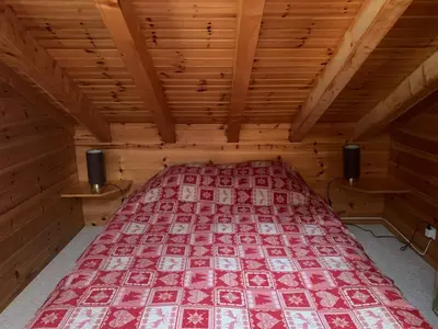 Ein Bett oder Betten in einem Zimmer der Unterkunft Chalet typique tout confort avec studio en dessous
