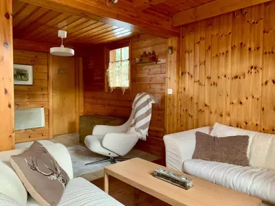Ein Sitzbereich in der Unterkunft Chalet typique tout confort avec studio en dessous