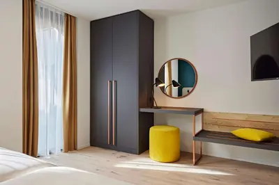 Ein Bett oder Betten in einem Zimmer der Unterkunft Essential by Dorint Interlaken - New Opening
