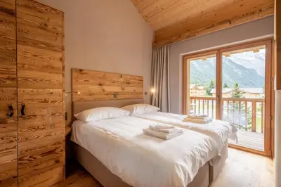 Ein Bett oder Betten in einem Zimmer der Unterkunft SWISSPEAK Resorts by Pierre & Vacances Premium Zinal