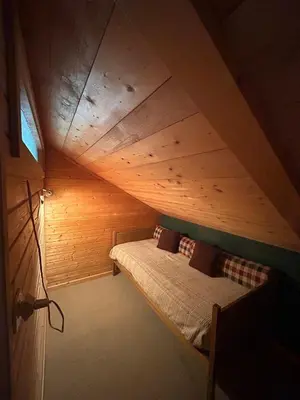 Ein Bett oder Betten in einem Zimmer der Unterkunft Cache-Cache MOUNTAIN & QUIET chalet 10 pers