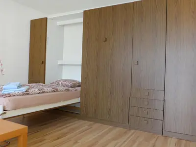 Ein Bett oder Betten in einem Zimmer der Unterkunft Apartment Imperial-5 by Interhome