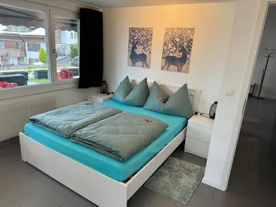 Ein Bett oder Betten in einem Zimmer der Unterkunft See und Berge Garden