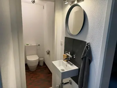 Ein Badezimmer in der Unterkunft See und Berge Garden