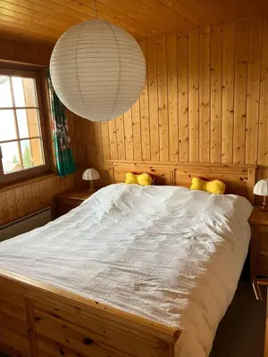 Ein Bett oder Betten in einem Zimmer der Unterkunft Chalet Pulsatilla