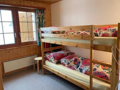 Ein Bett oder Betten in einem Zimmer der Unterkunft Chalet Pulsatilla